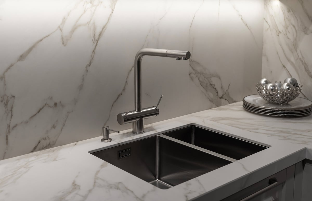 Stainless steel integrated sink with chrome kitchen faucet